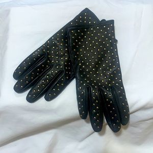 Gently loved black studded leather gloves.